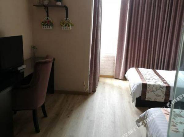 Cheng Dou Long Gang Shi Shang Hotel