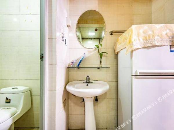 Xianqing Xiaozhan Apartment Hotel