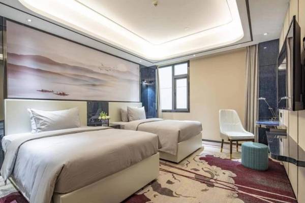 Ramada by Wyndham Mengzi Suites