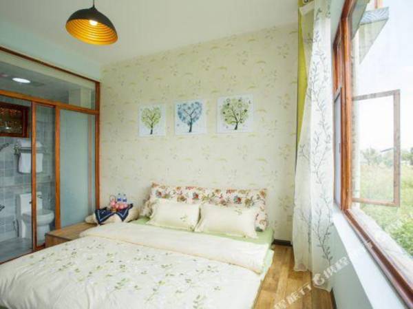 Da Li Qi Cai Yun Duo Inn