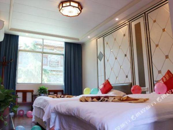 Towo Holiday Hotel (Manchuanguan Ancient Town Shop in Shanyang)