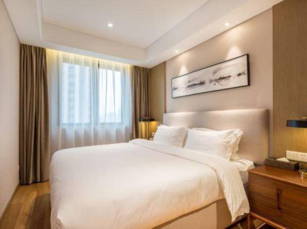 Homeplus Liyu Hotel (Suzhou Huaihai Street Sports Center)