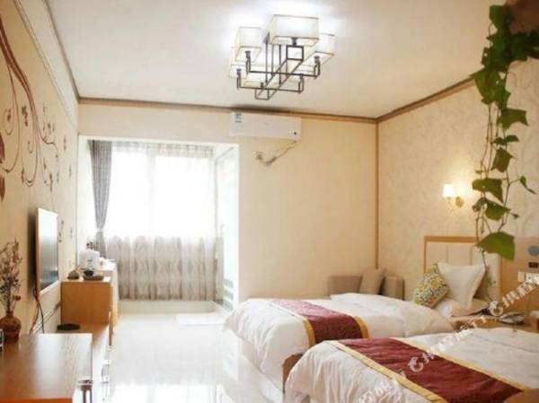 Xi Shuang Ban Na Mi Yu Wei Hotel