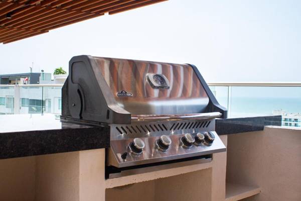 La Boquilla 4 personas frente a la playa