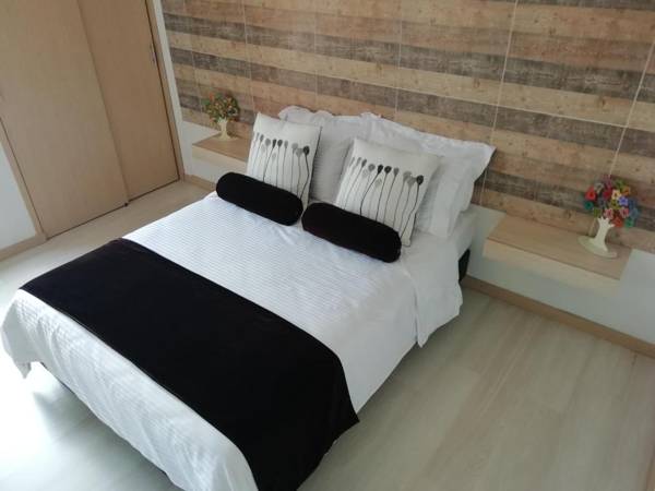 Apartasuite Laureles CMC