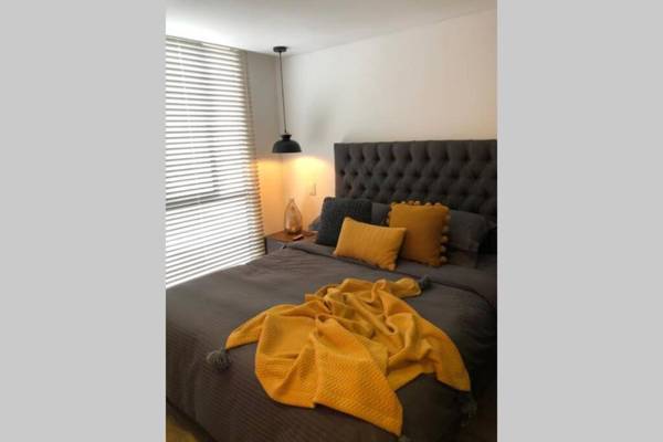 APARTAESTUDIO AMOBLADOFURNISHED STUDIO APARTMENT WIFI gratuito