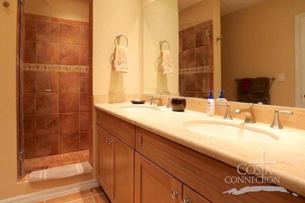 Luxe! Impressively designed 2nd-floor unit in Coco done in red and orange hues