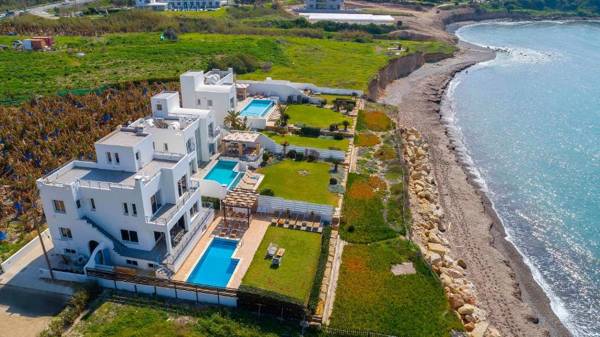 BLUE CORAL BEACH VILLAS three exclusive villas - Poseidon - Nautilus - Oceanos - and - Baby Coral bungalow