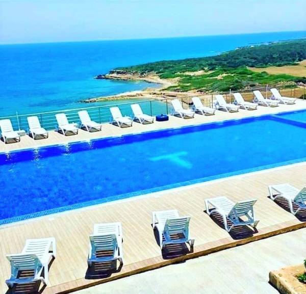 TEKOS GOLDEN HILLS Beachfront Hotel & Restaurant Best Location !