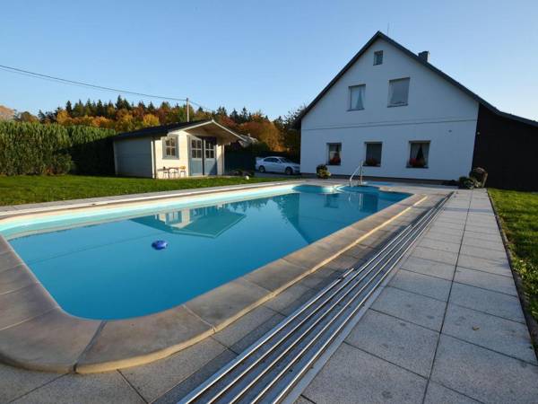 Comfortable apartment with covered pool and fenced garden