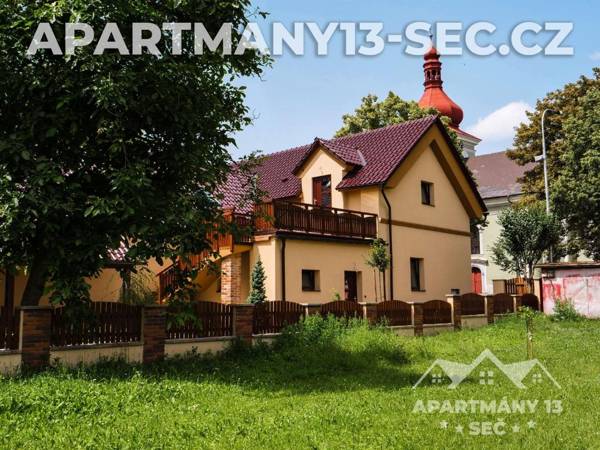 Apartmanový dům 13 Podkroví 1