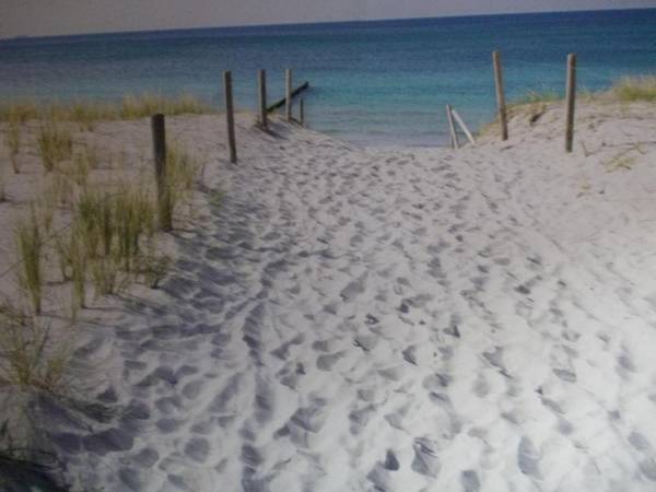 Ferienwohnung-Leuchtturm-Rosina-Kinderspieloase-Balkon-mit-Strandkorb-Garten-Fahrraeder-WLAN