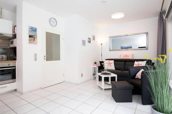 Badeweg 4 Sandkorn 1