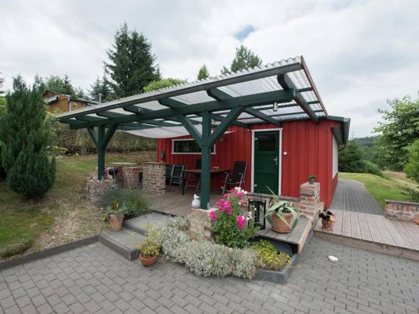 Detached holiday home in the Harz with wood stove and covered terrace