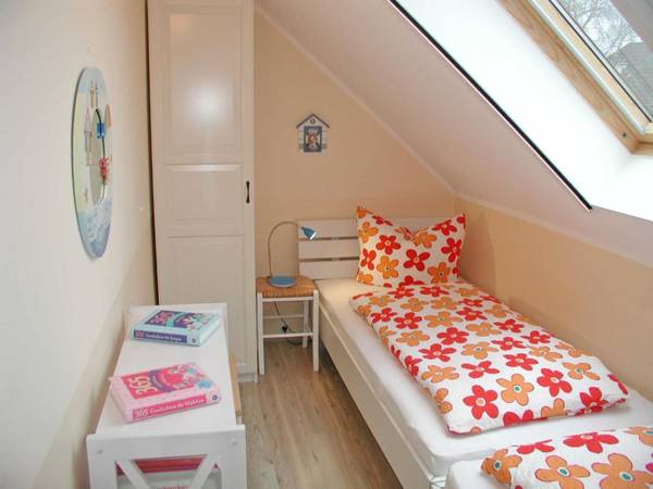 Ferienhaus Morgenstern F403 mit Kamin und Garten