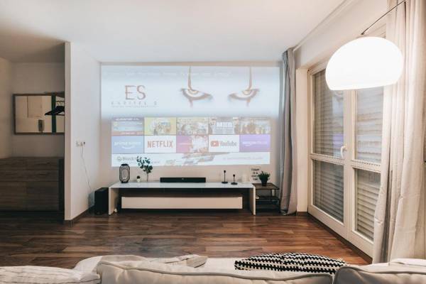 Modernes Apartment mit Heimkino Netflix und Bike