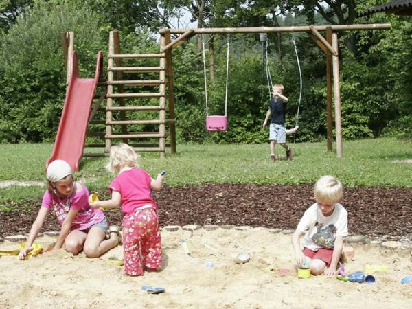 Single storey detached bungalow in a wooded area