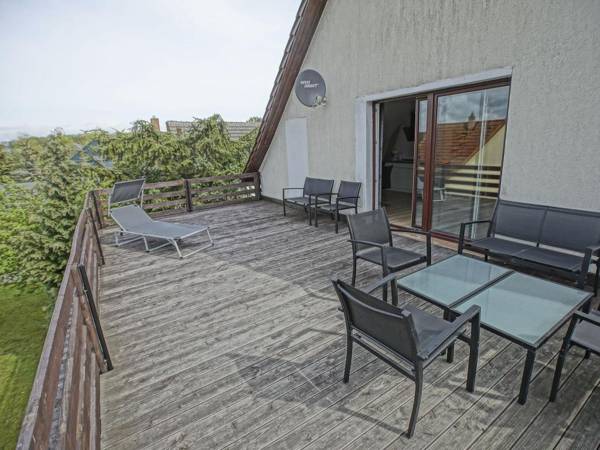 Large holiday home with roof terrace and big garden with lounge area and grill