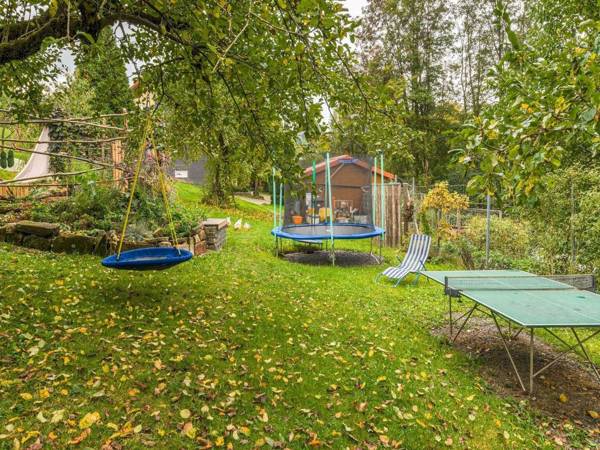 Cosy holiday home at the edge of town with a balcony and large garden