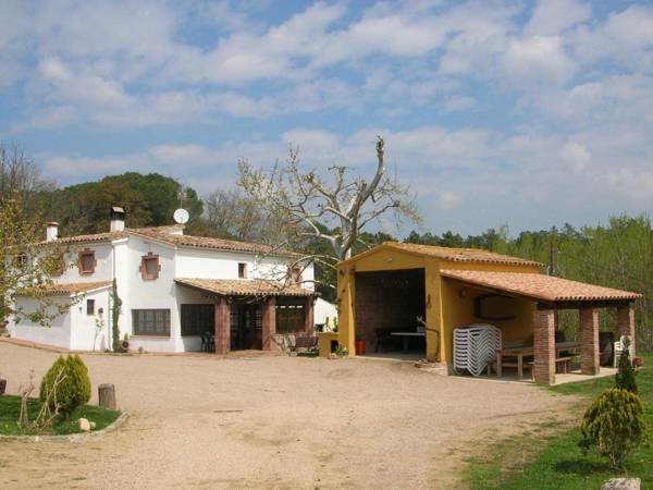 A farmhouse with a private swimming pool in the Costa Brava.