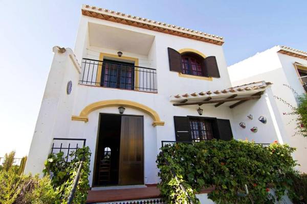 2 bedrooms house with shared pool furnished garden and wifi at Torrevieja 1 km away from the beach
