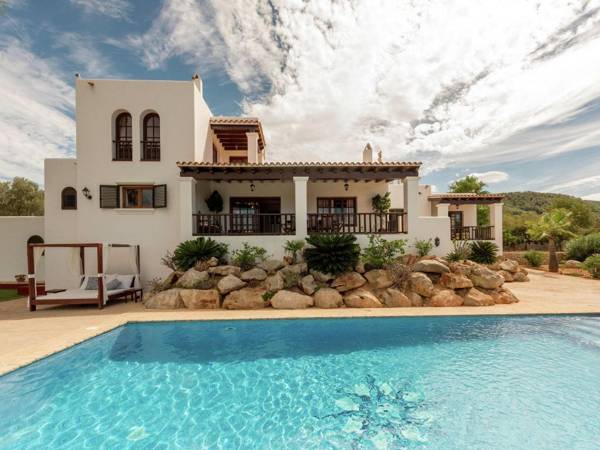 Alluring Mansion in Cala Tarida with Private Pool and Garden