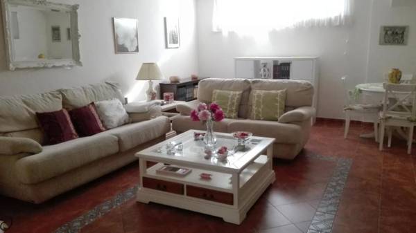 Bright apartment with bedroom living room and private bathroom by the sea.