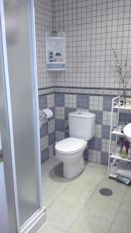 Bright apartment with bedroom living room and private bathroom by the sea.