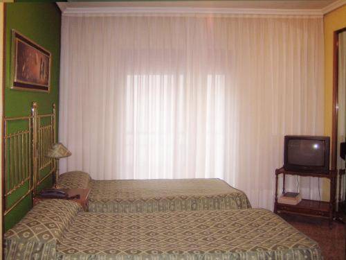 Apartamentos Olano C.B.