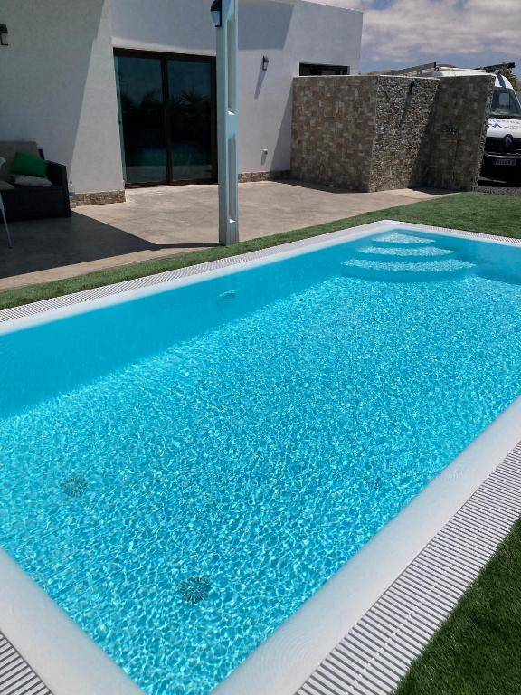 2 bedrooms villa with sea view private pool and furnished terrace at El Roque El Cotillo 1 km away from the beach