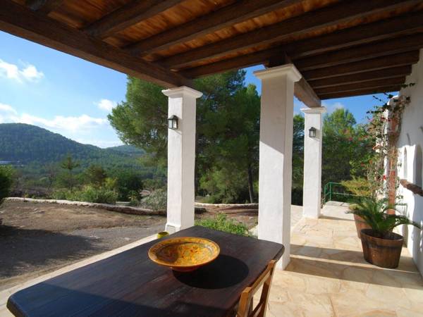 Holiday in true Ibiza style between hills with private pool