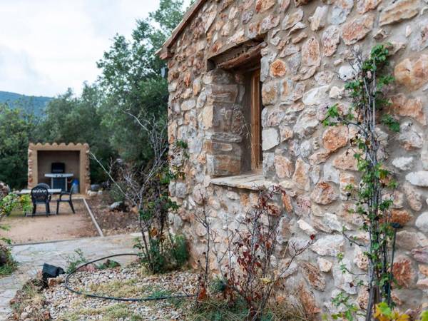 A beautifully restored farmhouse with a private pool in the mountains