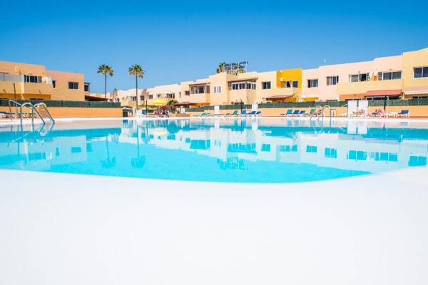 Family Apartment Delfines in Heart of Corralejo- Only 1 min to Sea with Pool & Free Wifi by Holidays Home