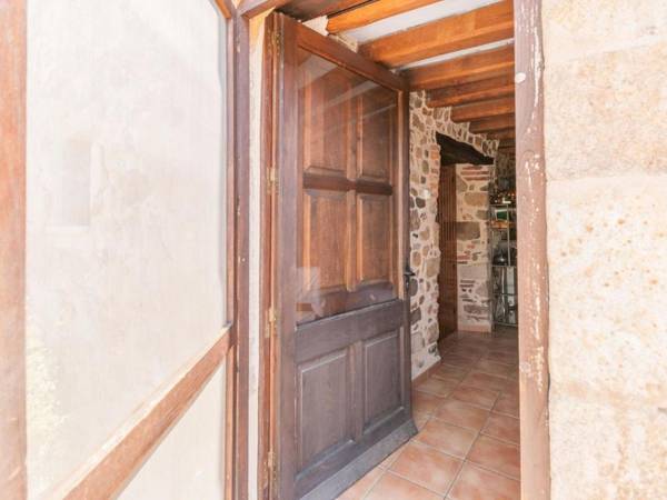 Catalan farmhouse with round pool in the middle of forest
