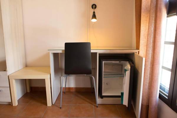 Pensión y apartamentos El Taxi