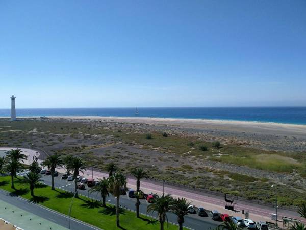 Near the beach with huge terrace parking and wifi