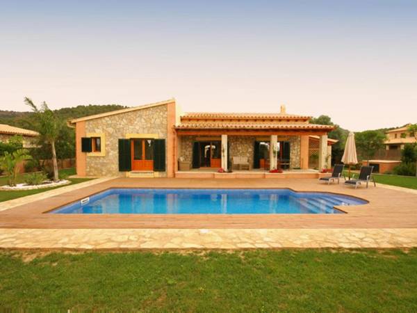 Modern villa surrounded by pine forests and mountains with private pool