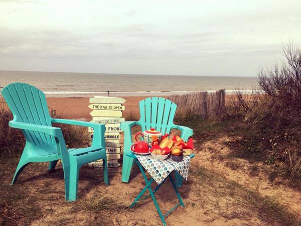 LES PIEDS DANS L'EAU