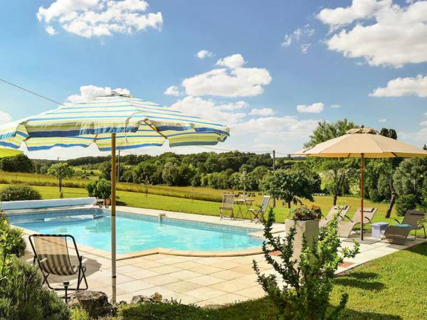 Traditional farmhouse with pool in the middle of the French countryside.