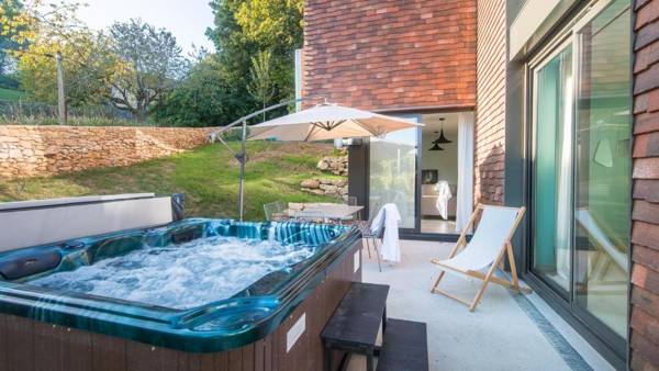 Côté Jardin avec Jacuzzi Privatif et parking privé