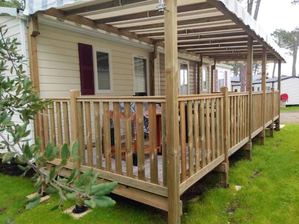 Bungalow de 3 chambres avec piscine partagee jardin amenage et wifi a Saint Julien en Born a 5 km de la plage