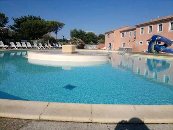 Maison de 2 chambres avec vue sur le lac piscine partagee et jardin clos a Le Barcares