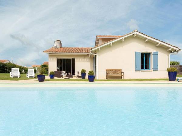 Spacious villa with private swimming pool near a golf course