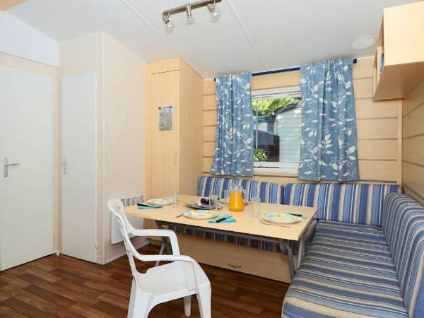 Cozy chalet with terrace in a wooded area close to Agde