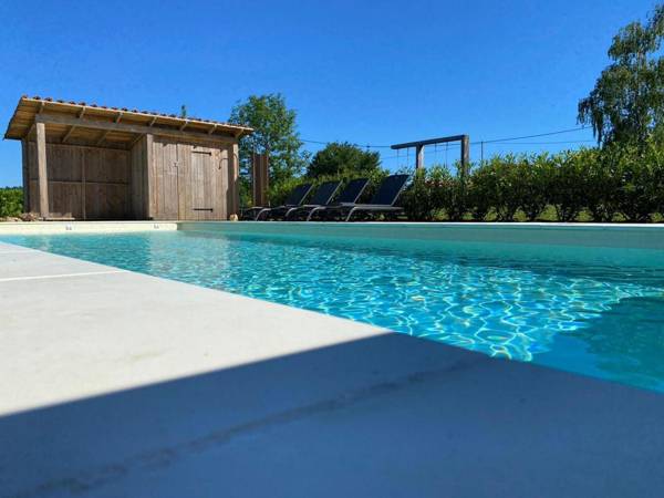 Charming holiday home in Rouzède with a private swimming pool
