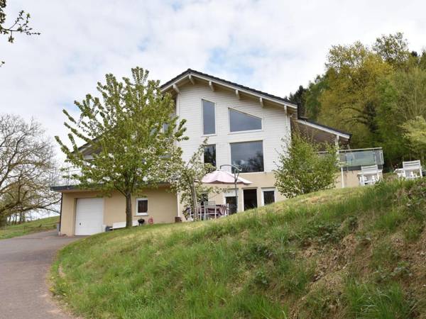 Holiday home with beautiful view on the village