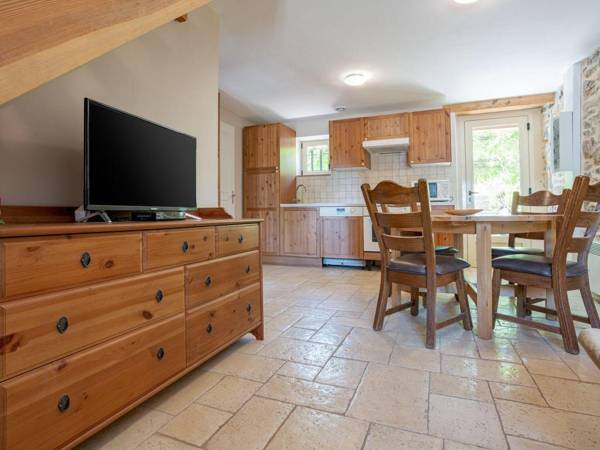 3 cottages around a swimming pool in a small village.