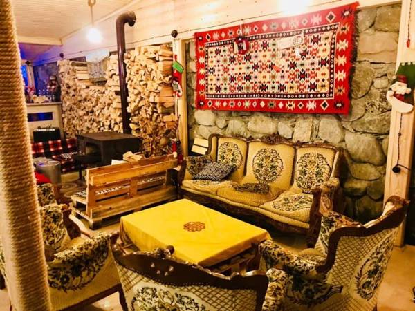 Wooden Huts In Mestia