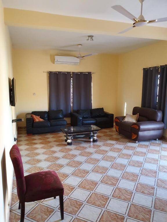 EXECUTIVE APARTMENT 2 master ensuite bedrooms 3 toilets 3 baths hot water air conditioned separate fitted kitchen separate living room large compound 24hr security electric fenced wall restaurant bar WIFI about 20 minutes from the airport