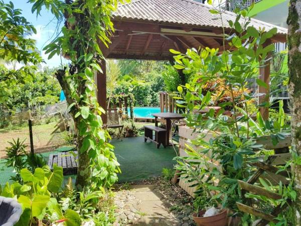 Maison de 3 chambres avec vue sur la mer piscine partagee et jacuzzi a Sainte Rose a 8 km de la plage